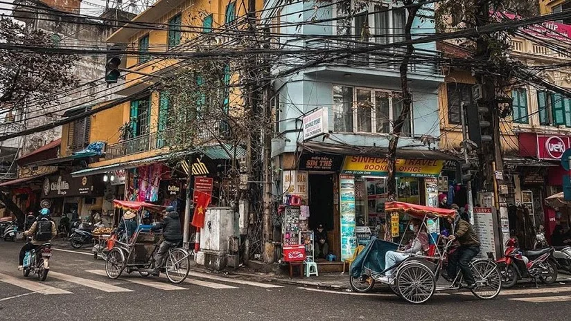 Bustling street scene in the Hanoi Old Quarter