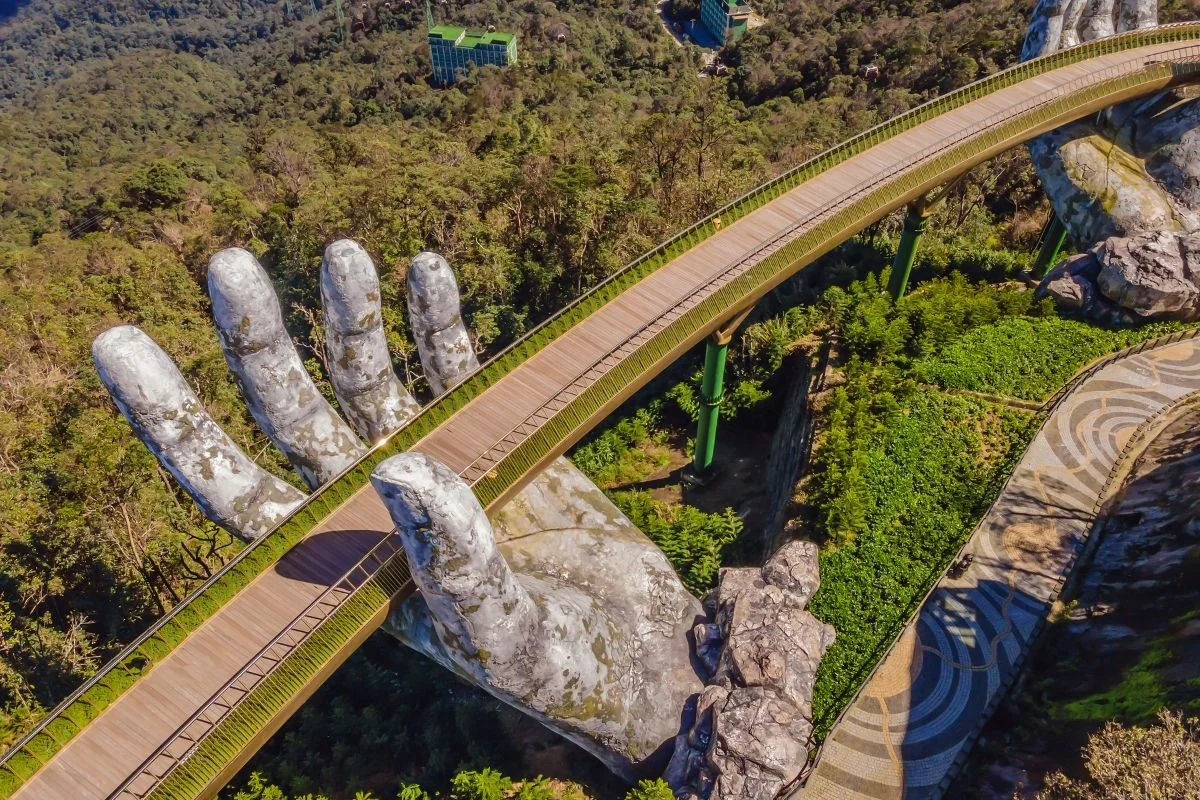 The Golden Bridge held by giant stone hands at Sun World Ba Na Hills.