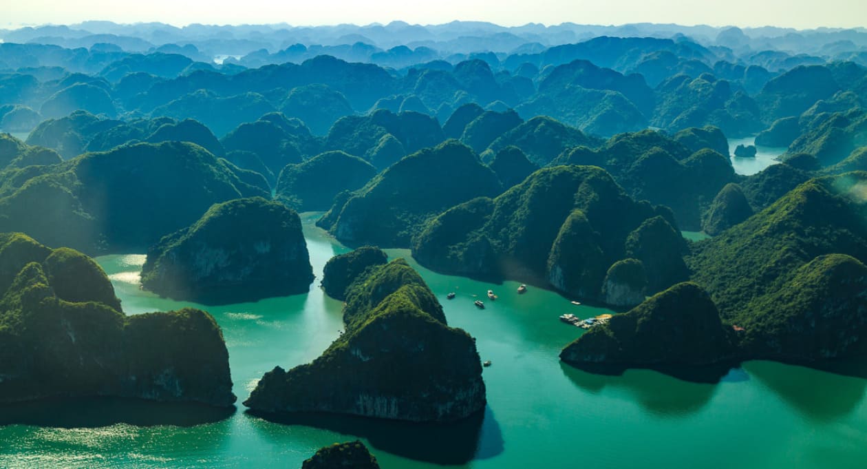 Breathtaking aerial shot of Ha Long Bay islands, a must-see destination for travelers arriving by Sapa to Ha Long Bay bus